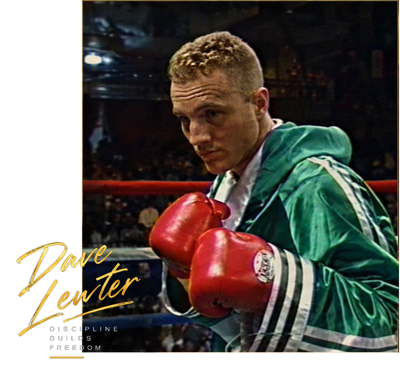 Dave Lewter in the boxing ring, with his signature and Discipline Builds Freedom motto
